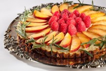 Peaches and Raspberries on a pineapple slice